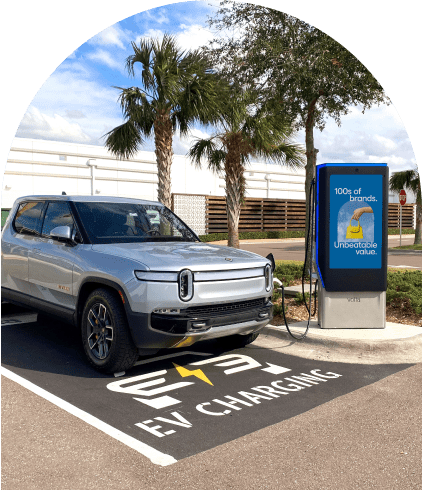 Inset photo of Tanger Daytona Beach, FL electric car charging station